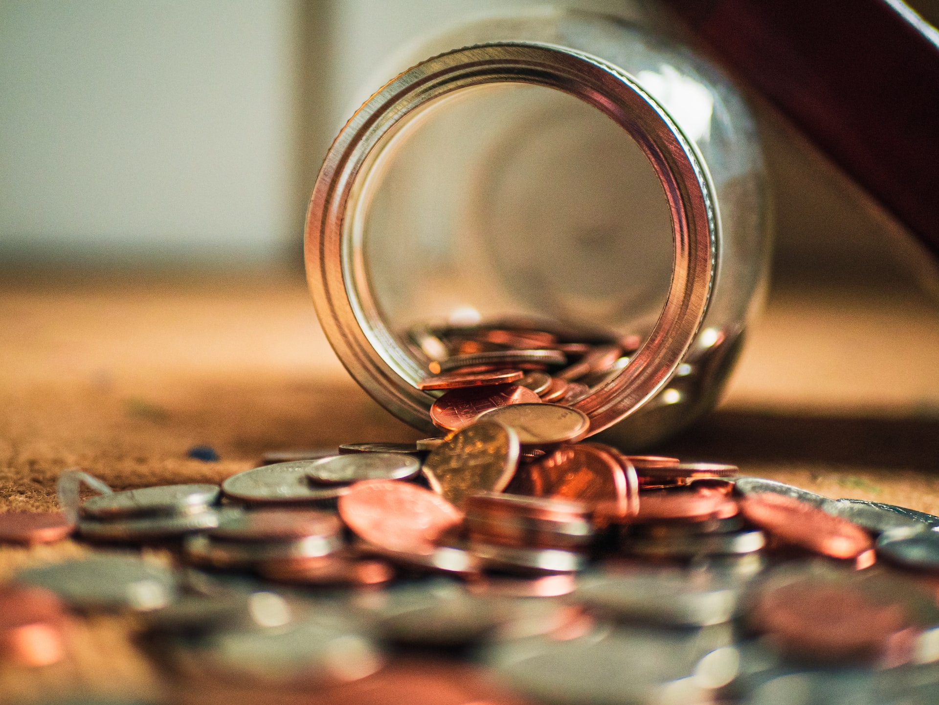 Coins tipped on table